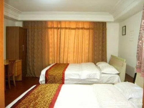 Mingjie Apartment Hotel Xinghai Jiete - Image 1