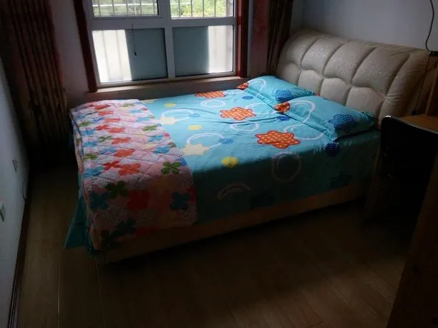 Jinshatan Qinglang Holiday Hotel - Image 1
