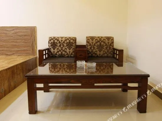 Huada Hotel Ding'an - Image 1