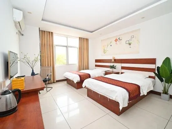 Wanlong Express Hotel (Beihai Ningchuncheng Shopping Plaza High-speed Railway Station) - Image 1