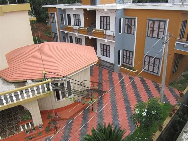 Harmony Inn Wayanad - Image 1