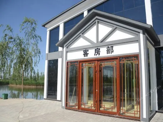 JINGZHUDAO HOLIDAY HOTEL - Image 1