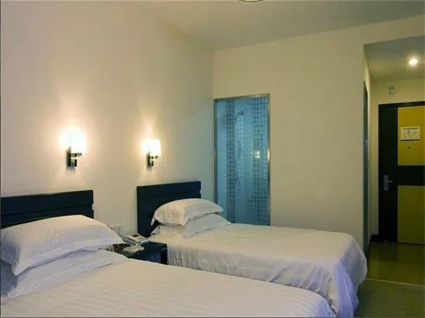 Pinghu Nine Dragon Business Hotel - Image 1