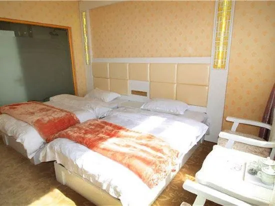 Mingge Busniess Hotel - Image 1