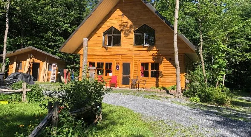CHALET EN BOIS ROND - Image 1