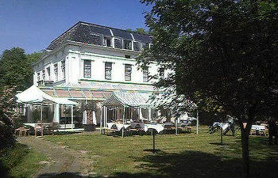 Green White Hotel - Image 1