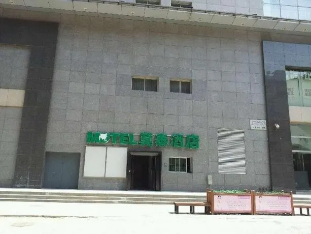 Motel Shenyang Railway Station Zhongxing Building - Image 1