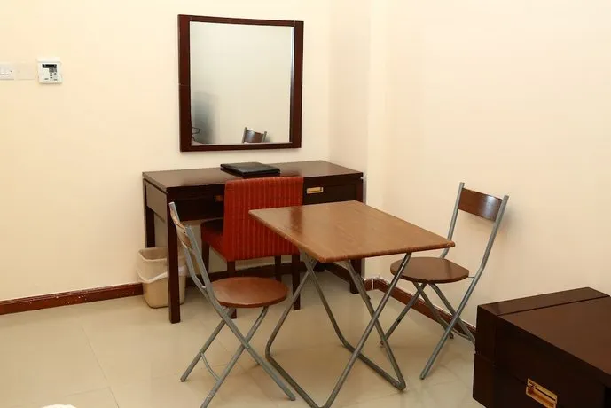 OYO 131 Golden Square Hotel Apartments - Image 1