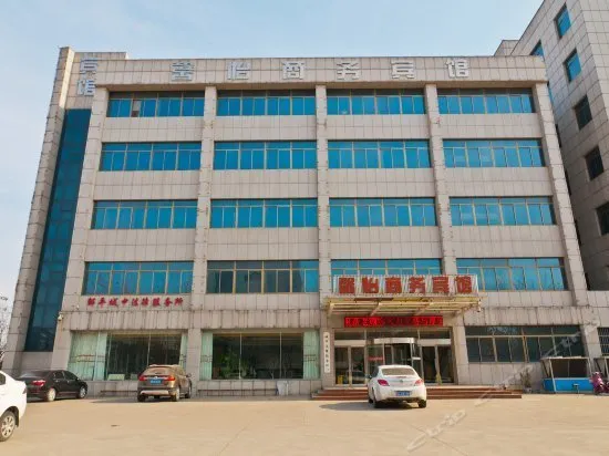 XINYI BUSINESS HOTEL - Image 1