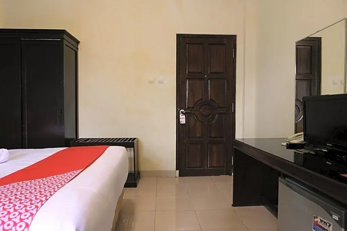 OYO 515 Oasis Hotel - Image 1