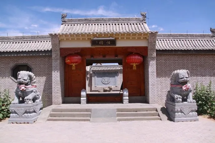 Jiucheng Palace Courtyard Inn - Image 1