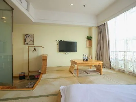 ZHELUOMAN CAFE HOTEL - Image 1