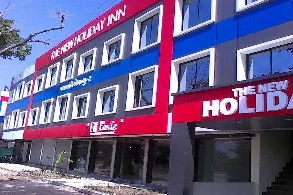 The New Holiday Inn By OYO Rooms - Image 1
