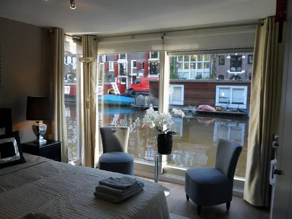 The Guest-Houseboat - Image 1