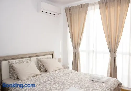 MODERNO 1 -Bedroom Apartment with Patio - Image 1