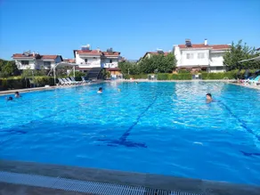A Peaceful Villa with a Garden and Pool - Image 3