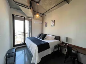 Modern apartment with a city view. - Image 5