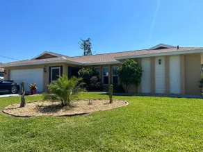 Sunny Florida Retreat 3BR, 2BA Heated Pool - Image 5