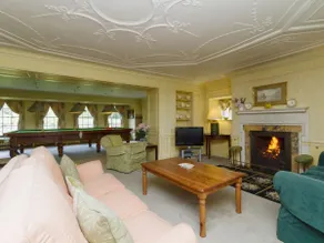 Historic manor house surrounded by mature gardens - Image 4