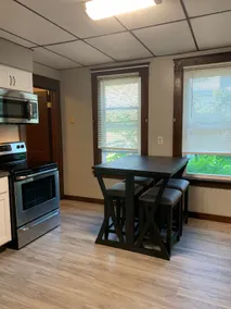 Recently updated in the quiet village of NY Mills. - Image 4