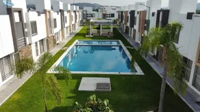 House in front of a beautiful pool - Image 3