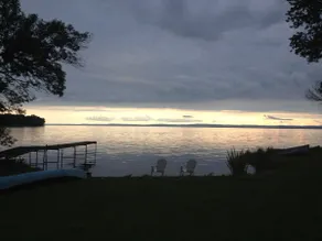 Experience the charm of a rustic lakefront cottage, perfect for year-round fun! - Image 4