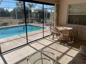 3 bed/ 2 bath home w/lanai & screened private pool - Image 2
