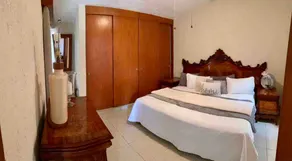 A beautiful condominium with a pool - Image 2