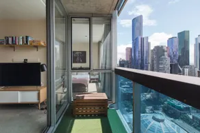 Modern Escape with Balcony & Sweeping City Views - Image 2