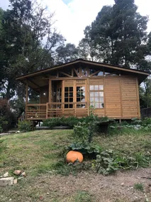 A nice cabin with a garden. - Image 3