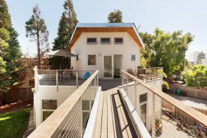 Unique tiny house w huge windows & deck, near lake - Image 2