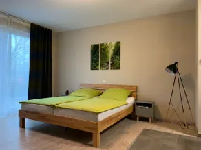 Two apartments²³ for 4 people in Nieder-Olm - Image 2