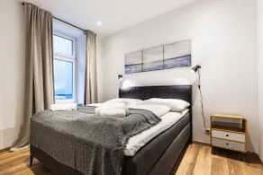 Modern apartment with a king-size bed in calm area - Image 2