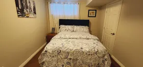 Unique full basement suite with spacious living room. - Image 3