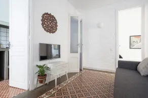 Surya BCN Apartment: Sun, relaxation, and Modernism. - Image 3