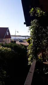 Idyllic and cozy in the old harbor town of Hjarbæk fjord. - Image 2