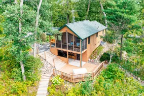 Secluded Waterfront Cabin on hiking trails! Lake on one side river on the other. - Image 2