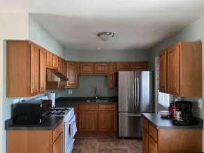 Cheerful 5 Bedroom home-free parking on premises. - Image 3