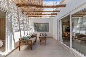 A nice house with an interior patio. - Image 5