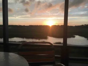 Location! -Peaceful Marsh-view w/ Screened Balcony - Image 2