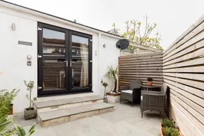 Charming Bolthole with Patio, & a Stroll from the Beach - Image 2