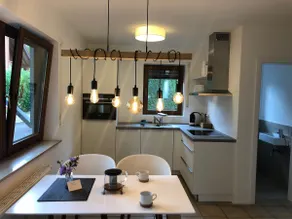 2 room apartment with lake view and private garden - Image 4