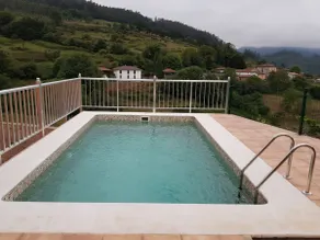 house with a pool and a hot tub - Image 4