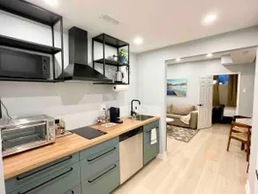 Discover Toronto in New Chic 9’ Ceiling Apartment - Image 5