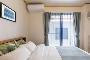 It can accommodate up to 12 people. Within walking distance to a natural beach with beautiful sunsets. Y's Okinawa Resort Base No. 3 - Image 4
