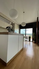 Design penthouse with terrace in the center of Olot - Image 4
