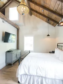 Unique Rustic Suite with Jacuzzi Tub, Kitchen, Fireplace, and Living Room - Image 3