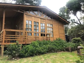 A nice cabin with a garden. - Image 2