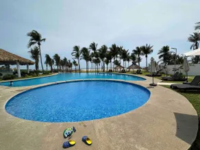 A vacation home with a pool and beach club - Image 3