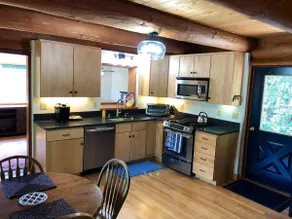 Rest, relax and recharge at this amazing log cabin - Image 5